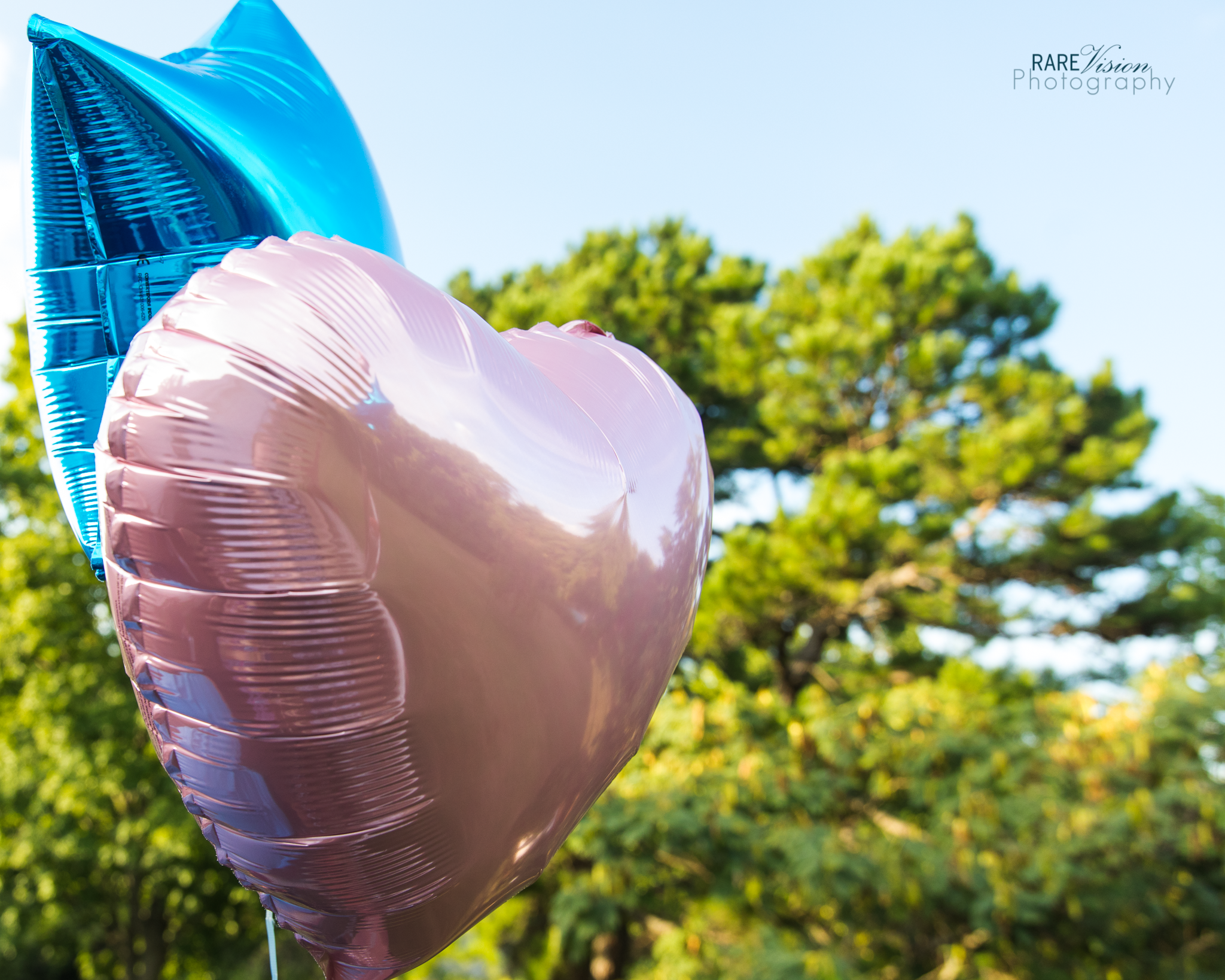 Image of blue and pink balloons