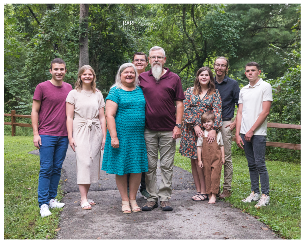 Image of the extended family looking and smiling