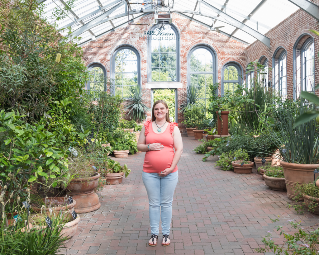 Image of mom holding her Baby Lucy bump