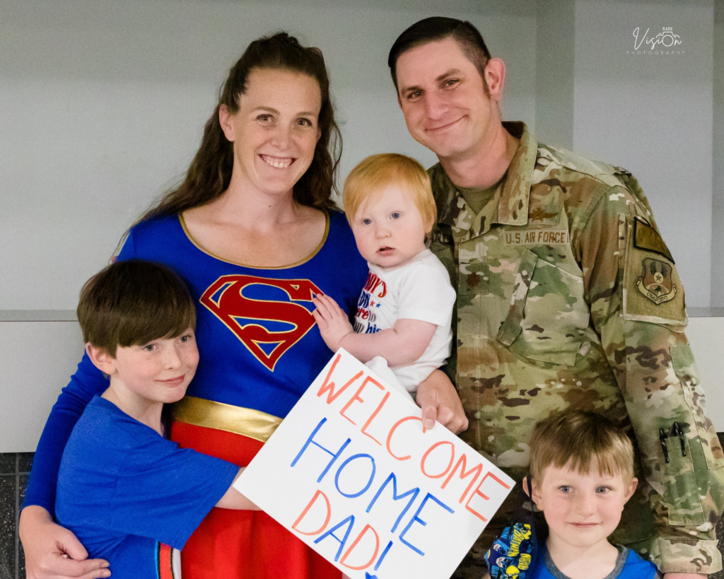 Image of family reunited after military deployment