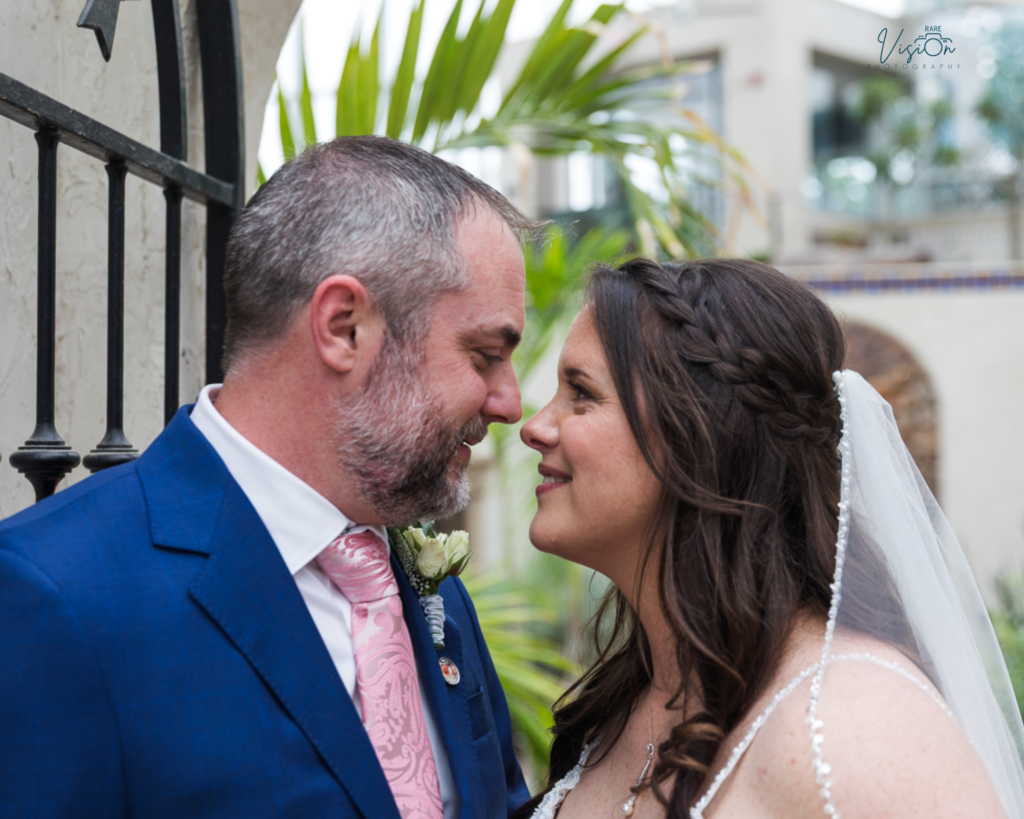 Bride and groom looking at one another