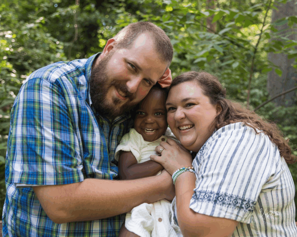 Image of parents with toddler