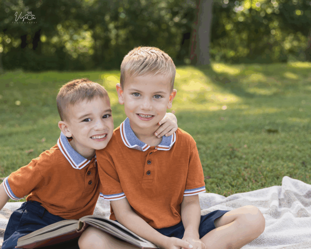 The Jones boys sitting and looking at the camera