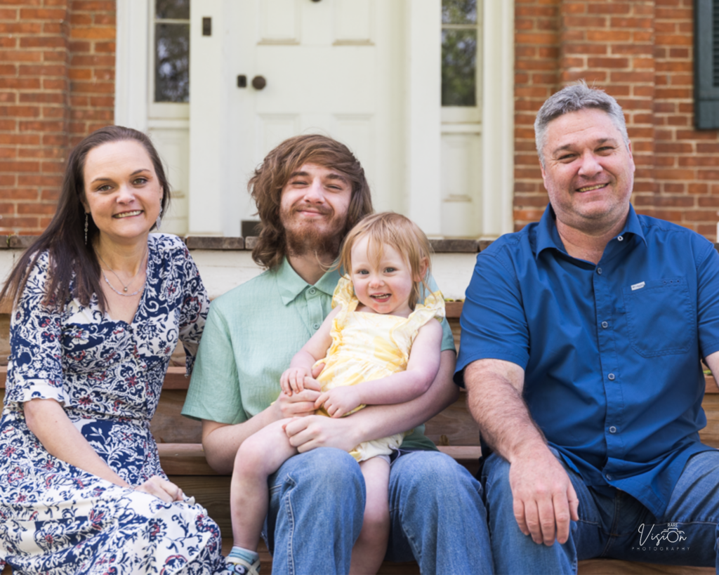 Image of parents alongside adult son and granddaughter