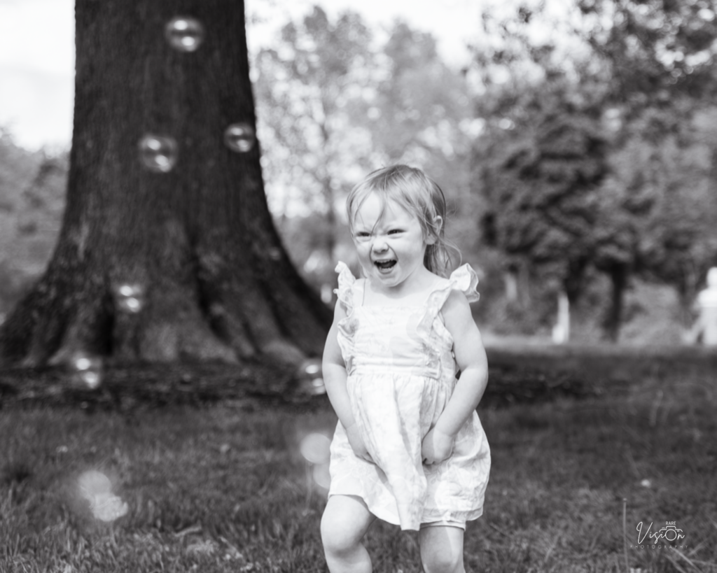 Image of little girl with bubbles