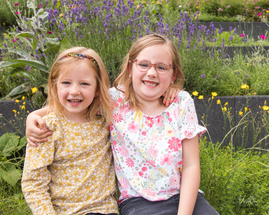 Image of sisters looking at the camera, posed image