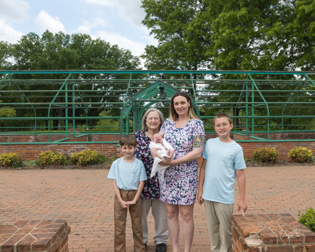Image of mom alongside her kids and mom