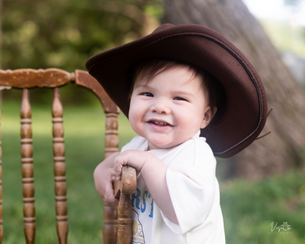 Image of boy holding onto chair